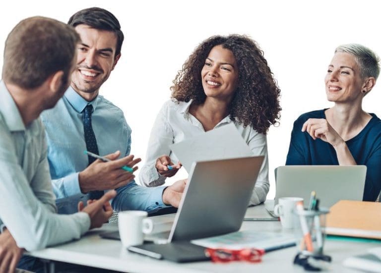 Business People Smiling In Meeting